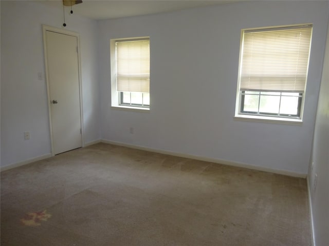 4810 Theall Rd, Houston, TX 77066 - empty room featuring carpet and baseboards