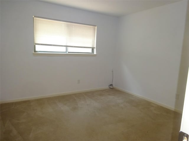4810 Theall Rd, Houston, TX 77066 - spare room featuring light colored carpet and baseboards