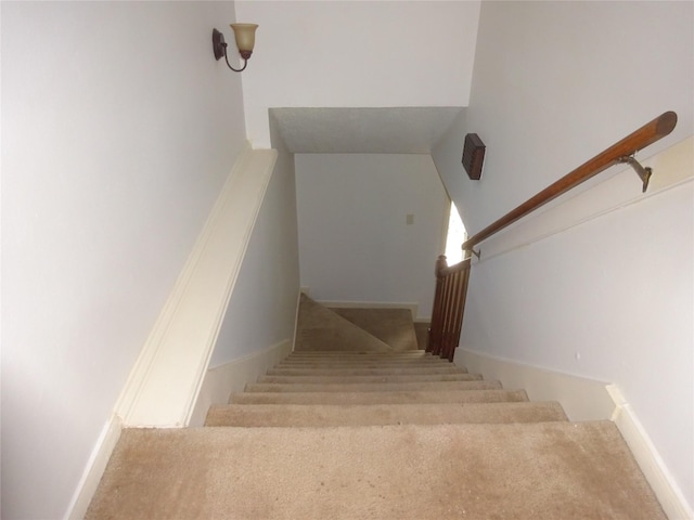 4810 Theall Rd, Houston, TX 77066 - stairway with carpet flooring and baseboards