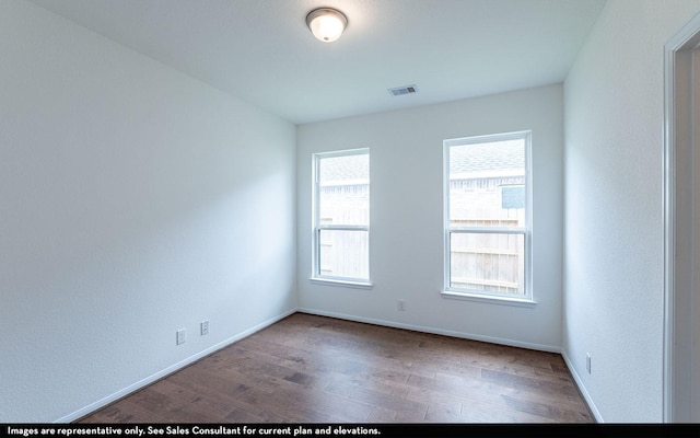 422 Riesling Dr, Alvin, TX 77511 - spare room with wood finished floors and baseboards