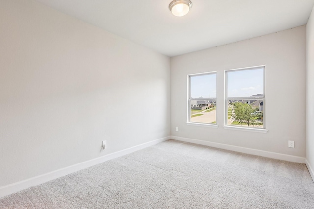 28814 Creekside Bend Dr, Fulshear, TX 77441 - empty room with baseboards and light carpet