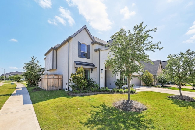 28814 Creekside Bend Dr, Fulshear, TX 77441 - view of front facade featuring driveway, a front lawn, and a garage
