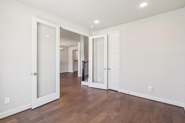 28814 Creekside Bend Dr, Fulshear, TX 77441 - unfurnished bedroom with dark wood-type flooring, baseboards, and recessed lighting