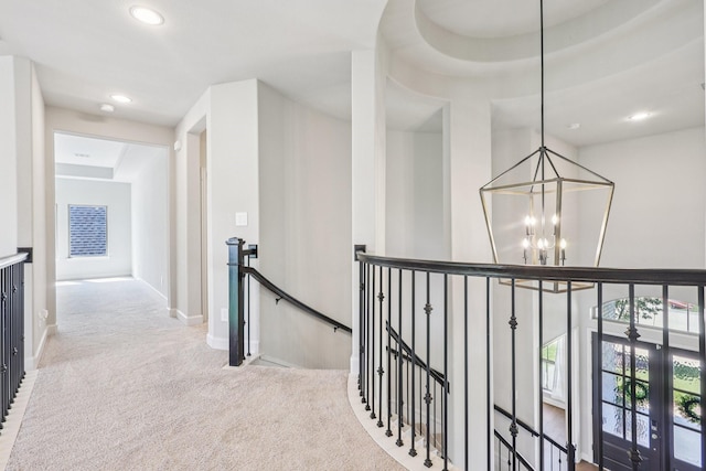 28814 Creekside Bend Dr, Fulshear, TX 77441 - hallway featuring an upstairs landing, a chandelier, carpet, baseboards, and recessed lighting