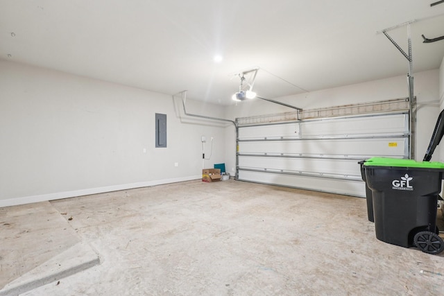 28814 Creekside Bend Dr, Fulshear, TX 77441 - garage with electric panel, a garage door opener, and baseboards