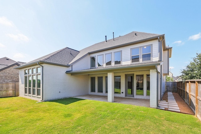 28814 Creekside Bend Dr, Fulshear, TX 77441 - rear view of property featuring brick siding, a patio, and a shingled roof