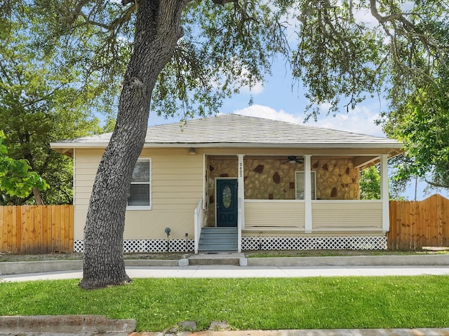 2402 49th St, Galveston, TX 77551 - bungalow with entry steps, ceiling fan, and stone siding