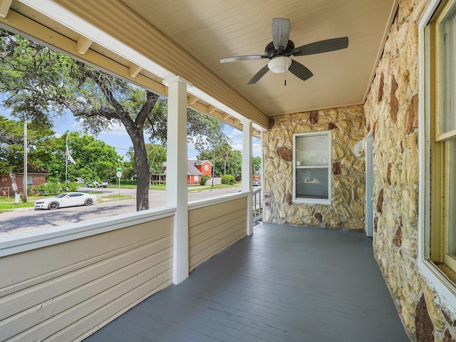 2402 49th St, Galveston, TX 77551 - unfurnished sunroom with a ceiling fan