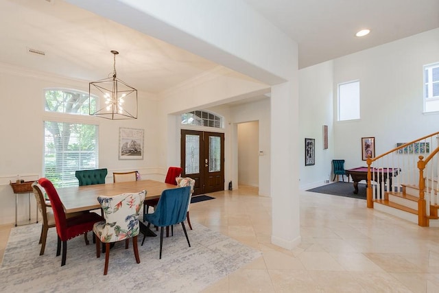 3011 Bonnebridge Way Blvd, Houston, TX 77082 - dining area with stairway, a chandelier, plenty of natural light, crown molding, and light tile patterned floors
