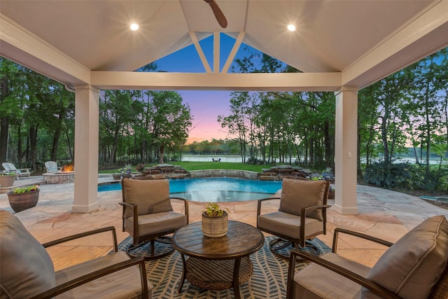 3806 W Benders Landing Blvd, Spring, TX 77386 - view of patio with an outdoor fire pit, a water view, and an outdoor pool