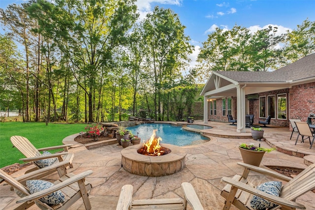 3806 W Benders Landing Blvd, Spring, TX 77386 - swimming pool featuring a fire pit, a patio, a yard, and a jacuzzi