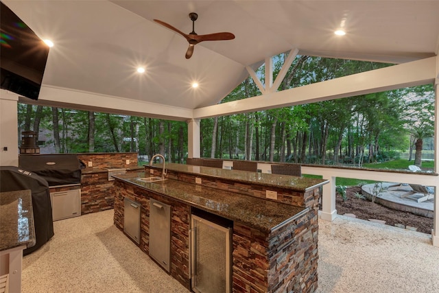 3806 W Benders Landing Blvd, Spring, TX 77386 - view of patio / terrace with a sink, exterior kitchen, a ceiling fan, and view of wooded area