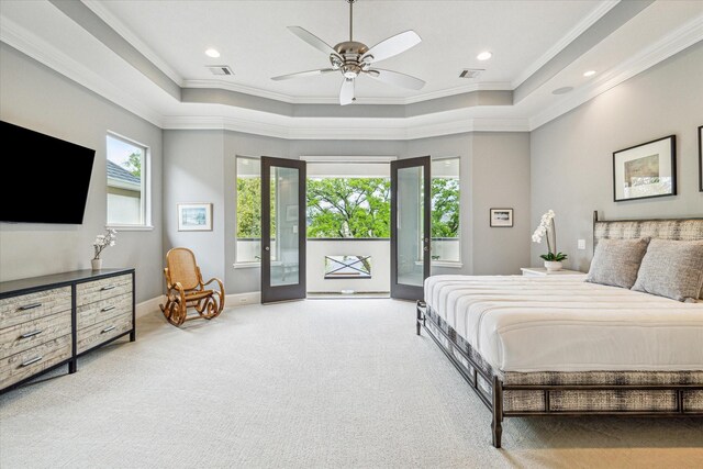 6619 Minola St, Houston, TX 77007 - carpeted bedroom featuring a raised ceiling, access to exterior, ornamental molding, baseboards, and recessed lighting