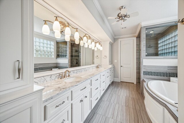 6619 Minola St, Houston, TX 77007 - full bath with a stall shower, crown molding, double vanity, a bath, and ceiling fan
