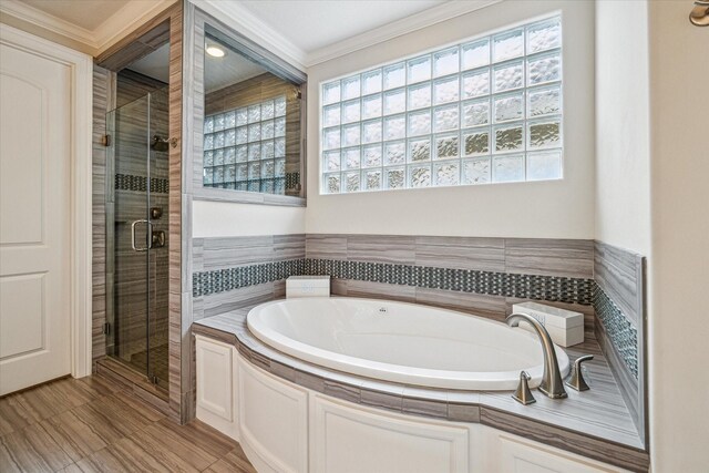6619 Minola St, Houston, TX 77007 - full bathroom featuring ornamental molding, a bath, and a shower stall