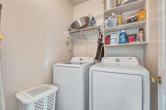9303 Filaree Ridge Ln, Houston, TX 77089 - laundry room with washer and clothes dryer