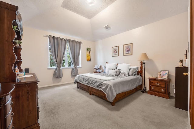 9303 Filaree Ridge Ln, Houston, TX 77089 - carpeted bedroom featuring baseboards, a textured ceiling, and lofted ceiling
