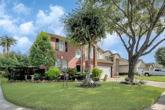 9303 Filaree Ridge Ln, Houston, TX 77089 - view of front of home featuring an attached garage, driveway, brick siding, and a front lawn
