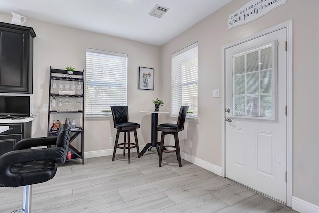 9303 Filaree Ridge Ln, Houston, TX 77089 - office area with plenty of natural light, baseboards, and light wood-style flooring