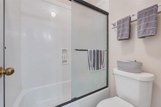 9303 Filaree Ridge Ln, Houston, TX 77089 - bathroom featuring toilet and combined bath / shower with glass door