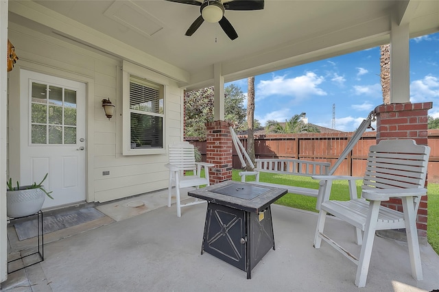 9303 Filaree Ridge Ln, Houston, TX 77089 - fenced backyard featuring ceiling fan, a patio, and an outdoor fire pit