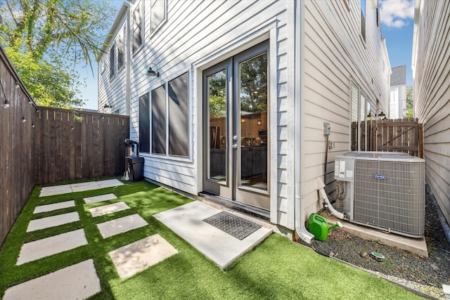 823 Mansfield St Unit E, Houston, TX 77091 - doorway to property featuring central AC and french doors
