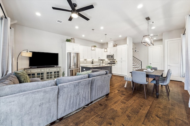 823 Mansfield St Unit E, Houston, TX 77091 - living area featuring ceiling fan, recessed lighting, dark wood-style floors, and stairway