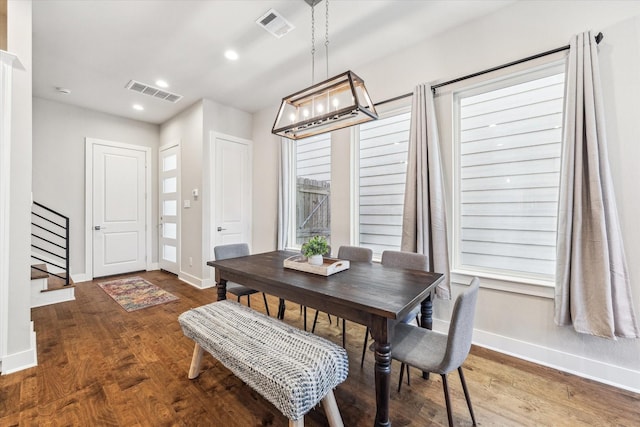 823 Mansfield St Unit E, Houston, TX 77091 - dining space featuring stairway, baseboards, wood finished floors, and recessed lighting
