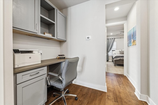 823 Mansfield St Unit E, Houston, TX 77091 - office featuring built in desk, dark wood-style flooring, baseboards, and recessed lighting