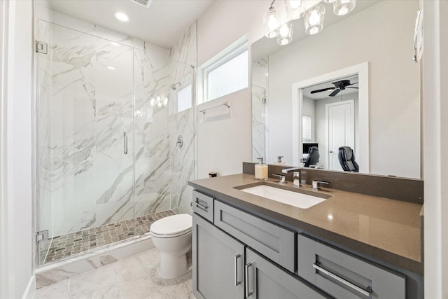 823 Mansfield St Unit E, Houston, TX 77091 - bathroom featuring a marble finish shower, toilet, vanity, marble look tiles, and ceiling fan