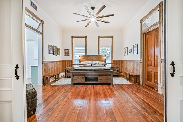 1805 Market St, Galveston, TX 77550 - entryway with wainscoting, hardwood / wood-style flooring, a ceiling fan, and wooden walls