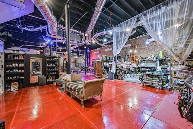 1805 Market St, Galveston, TX 77550 - interior space with finished concrete floors and brick wall