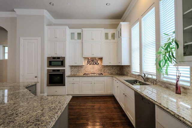 9642 Fannin Sta W, Houston, TX 77045 - kitchen with a sink, dishwashing machine, gas stovetop, dark wood finished floors, and ornamental molding