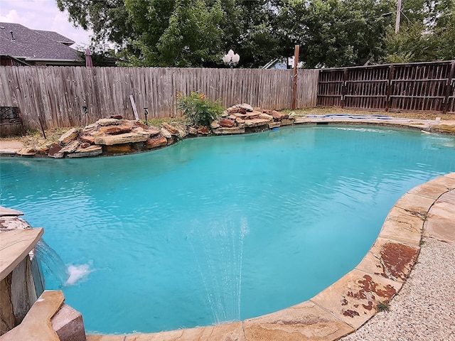 1017 Water St, Navasota, TX 77868 - view of swimming pool with a fenced backyard