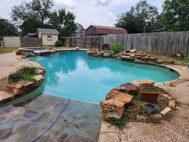1017 Water St, Navasota, TX 77868 - view of pool featuring an in-ground hot tub and a fenced backyard