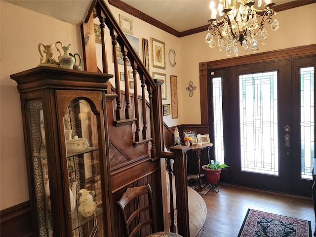 1017 Water St, Navasota, TX 77868 - foyer entrance with plenty of natural light, stairway, wood finished floors, and ornamental molding