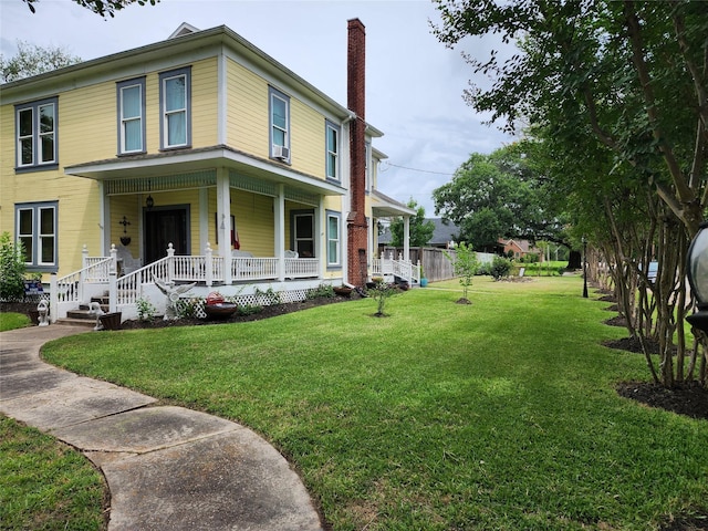 1017 Water St, Navasota, TX 77868 - view of property exterior with a chimney, covered porch, and a yard
