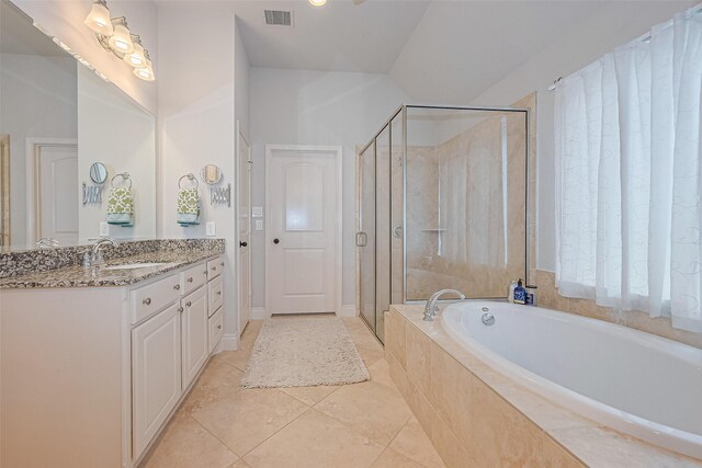 1622 Quail Ridge Dr, Katy, TX 77493 - bathroom with vanity, a bath, a shower stall, and tile patterned flooring