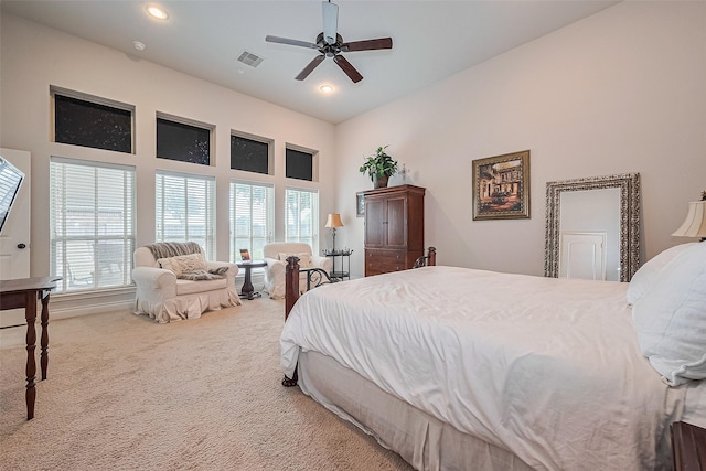 1622 Quail Ridge Dr, Katy, TX 77493 - carpeted bedroom with multiple windows, ceiling fan, recessed lighting, and a towering ceiling