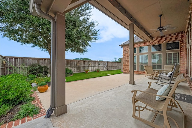 1622 Quail Ridge Dr, Katy, TX 77493 - fenced backyard with a ceiling fan and a patio area