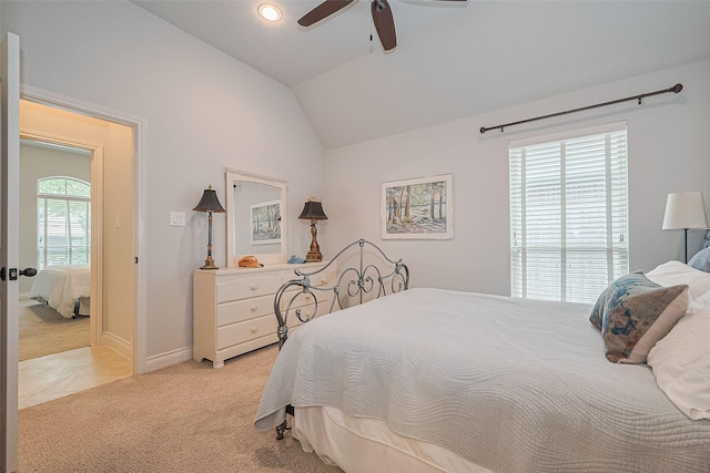1622 Quail Ridge Dr, Katy, TX 77493 - bedroom featuring light colored carpet, vaulted ceiling, ceiling fan, light tile patterned floors, and baseboards