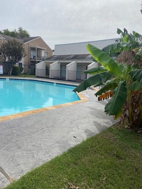 3726 Thistlemont Dr, Houston, TX 77042 - community pool featuring a patio area