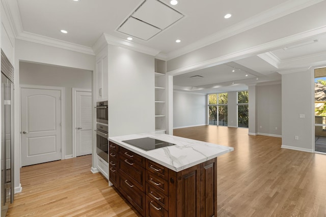 511 S Post Oak Ln Unit 2B, Houston, TX 77056 - kitchen featuring black electric stovetop, light wood finished floors, ornamental molding, double oven, and recessed lighting