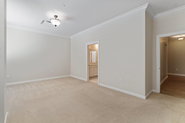 511 S Post Oak Ln Unit 2B, Houston, TX 77056 - empty room featuring ornamental molding, light carpet, and baseboards