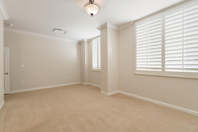511 S Post Oak Ln Unit 2B, Houston, TX 77056 - unfurnished room featuring ornamental molding, light carpet, and baseboards