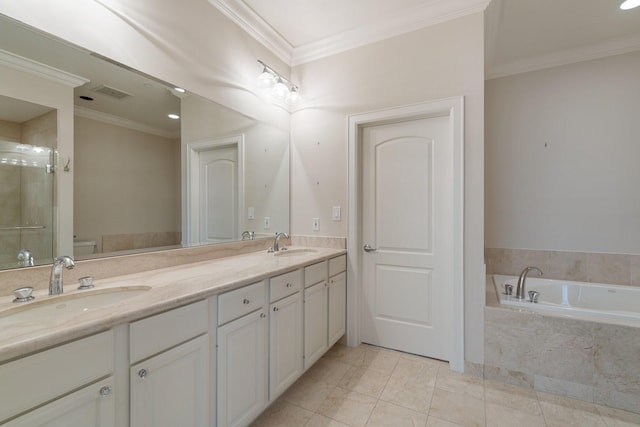 511 S Post Oak Ln Unit 2B, Houston, TX 77056 - bathroom with a bath, double vanity, crown molding, a stall shower, and toilet
