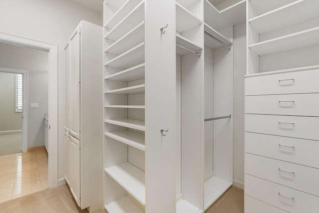 511 S Post Oak Ln Unit 2B, Houston, TX 77056 - spacious closet featuring light colored carpet