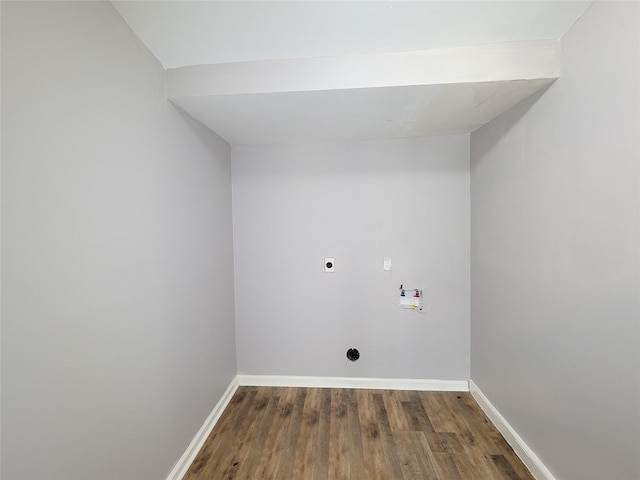 2928 Wayne St, Houston, TX 77026 - washroom featuring hookup for an electric dryer, hookup for a washing machine, wood finished floors, and baseboards