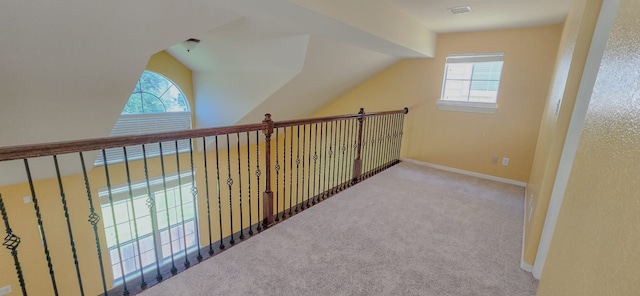10722 Clearview Villa Pl, Houston, TX 77025 - corridor with healthy amount of natural light, carpet floors, and lofted ceiling