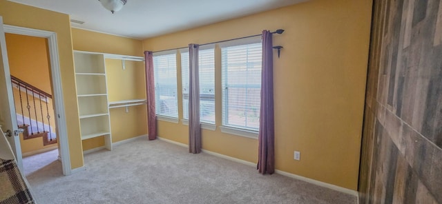 10722 Clearview Villa Pl, Houston, TX 77025 - unfurnished bedroom with carpet flooring and baseboards